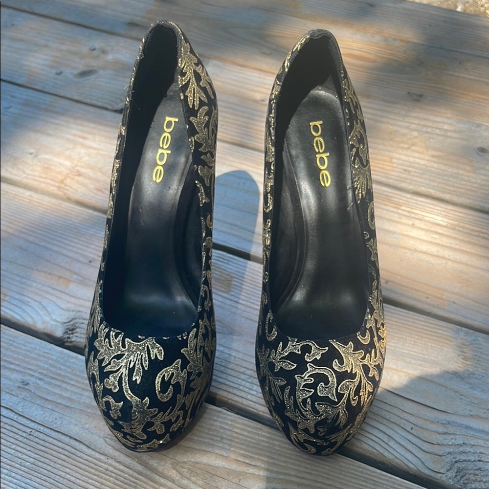 Bebe Black and Gold Stiletto Heels with Floral Pattern